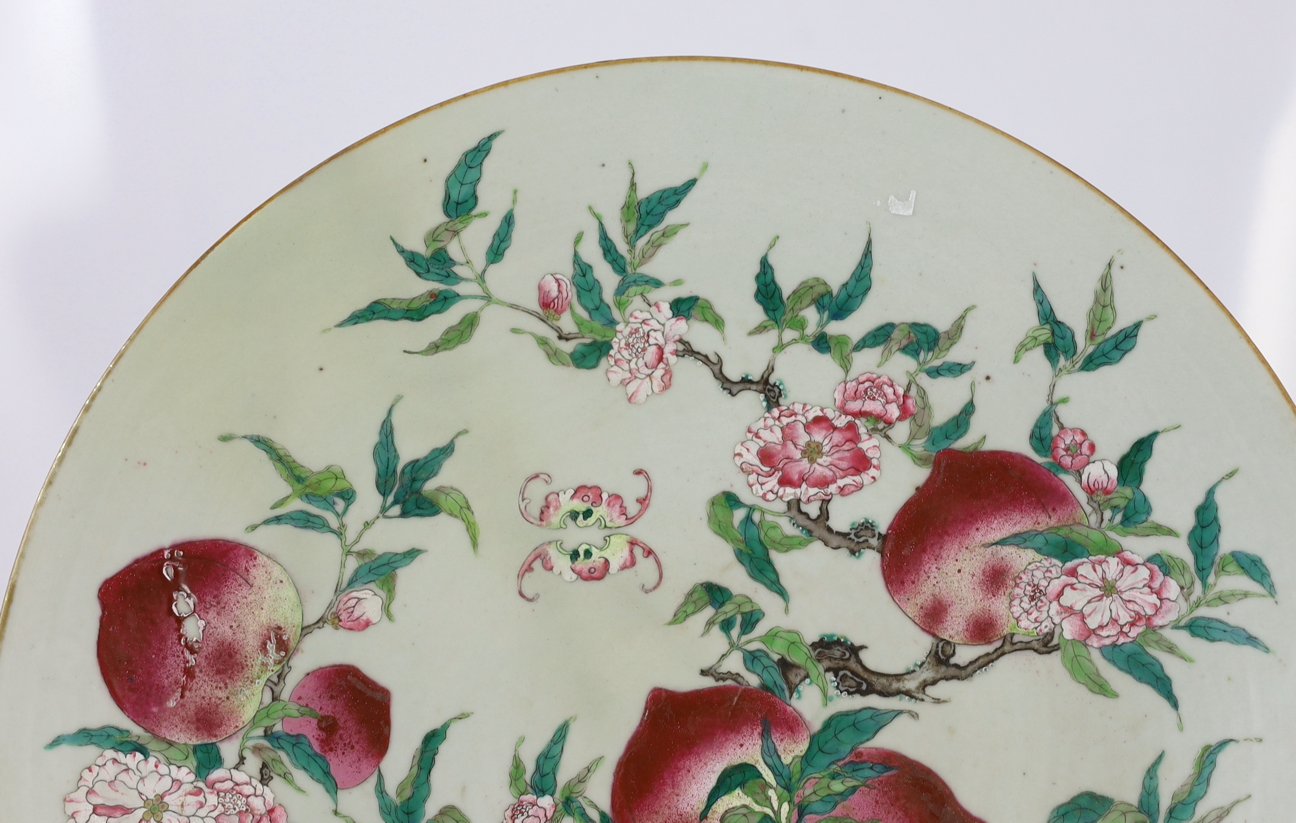 A large Chinese ‘nine peach’ enamelled porcelain dish, Qianlong seal mark but 19th century